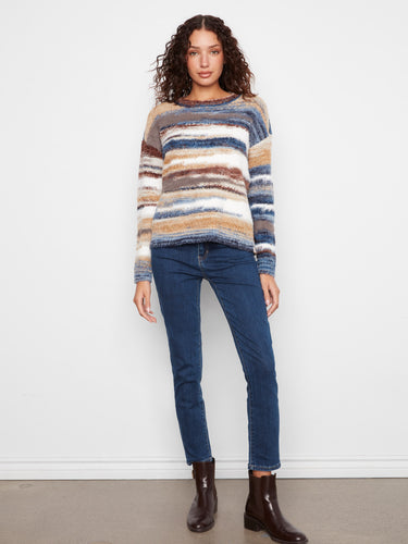 Earth-toned striped sweater crafted from soft space dye fabric, perfect for chilly days by Charlie B.