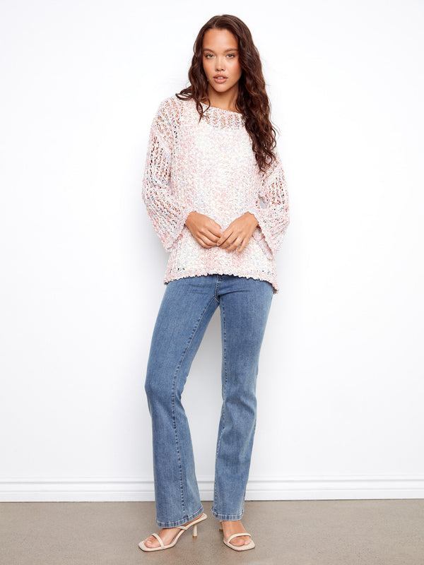 Designed with drop shoulders, this top provides a relaxed and comfortable fit for everyday wear. By Charlie B.