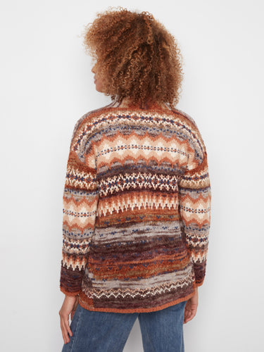 Warm and stylish long sleeve cardigan crafted in soft fabric, offering comfort and style all day long. By Charlie B.