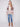 Elegant rosewood cardigan with geometric details and side seams pockets for added convenience by Charlie B.