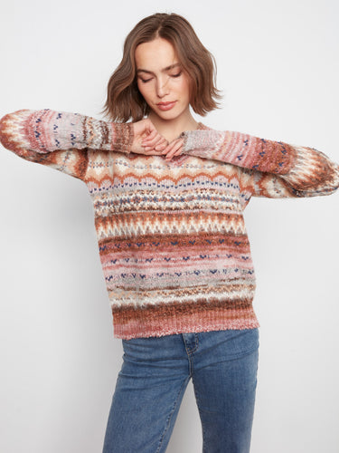 Long sleeve design adds comfort and style to this patterned sweater by Charlie B.