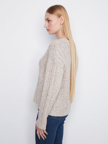 The unique cable-knit pattern elevates this classic sweater into a must-have fashion piece. By Charlie B.