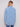 Light blue jacket with adjustable snap button cuffs, perfect for versatile styling by Charlie B.
