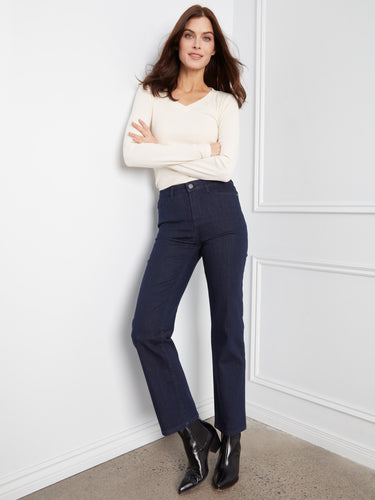 Long length denim enhances your look with elegance and versatility, suitable for both casual and formal settings. By Charlie B.