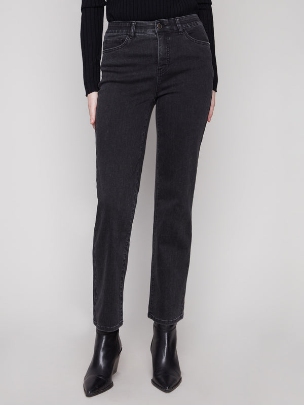 These jeans boast an elastic inside waistband, ensuring a comfortable fit by Charlie B.