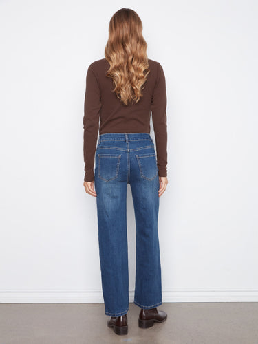 Classic five-pocket design enhances these stylish denim jeans with playful heart patch details. By Charlie B.