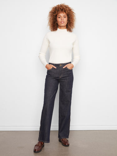 Regular rise jeans crafted from premium stretch denim for a flattering fit that enhances your silhouette by Charlie B.