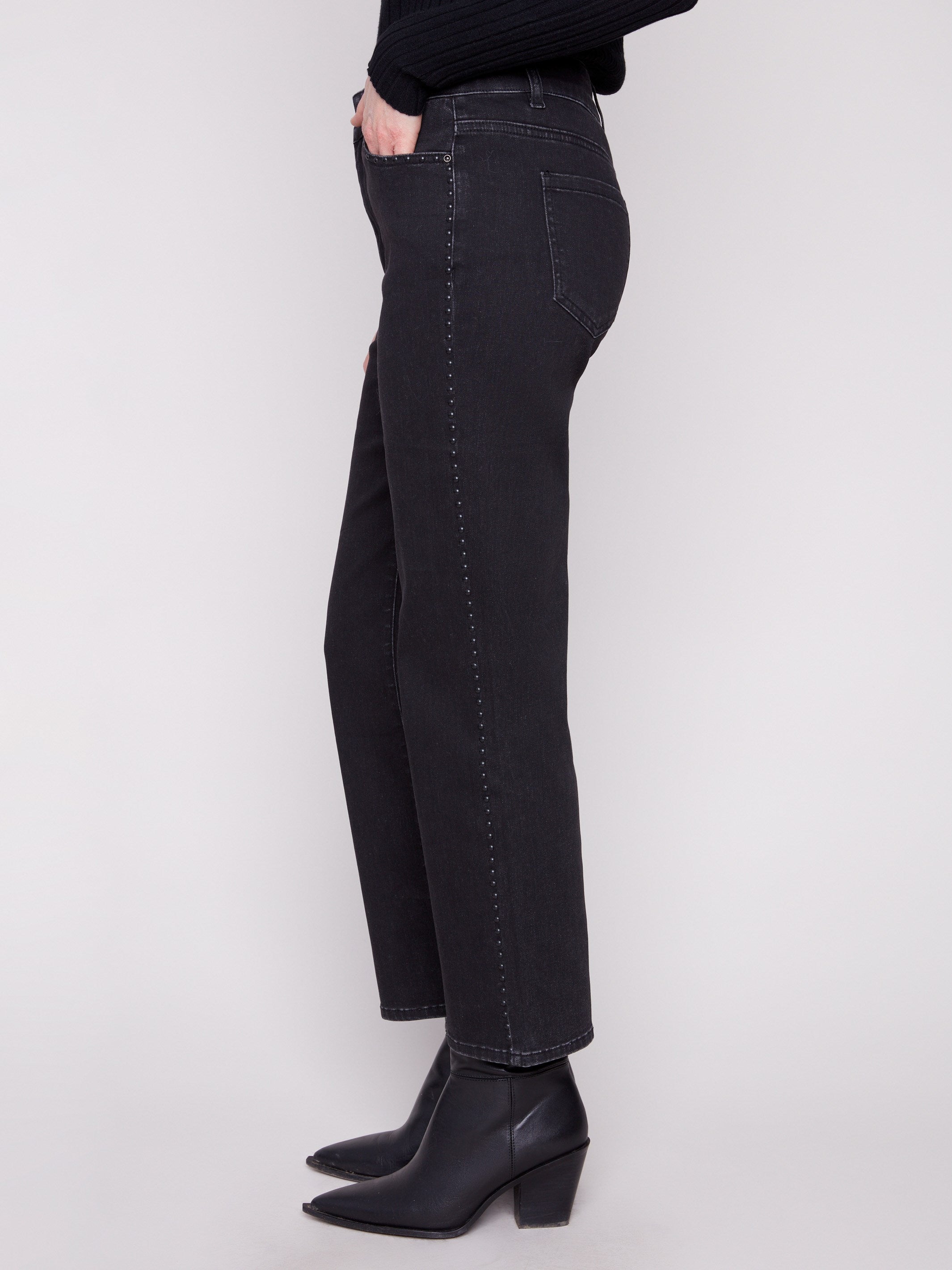 These charcoal jeans showcase a long length with stylish studs on the sides by Charlie B.