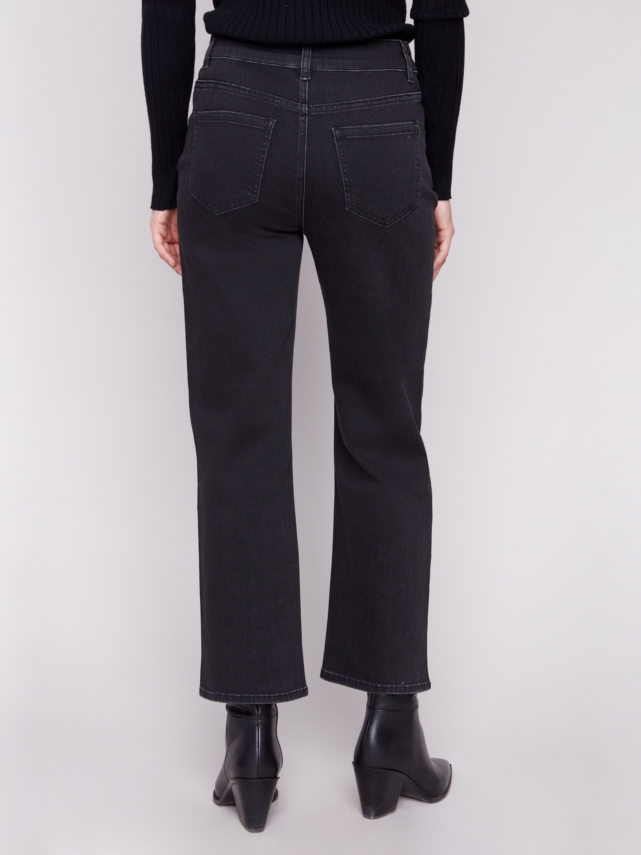 Designed with a regular rise, these charcoal jeans offer a classic five-pocket style by Charlie B.
