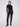 Black straight-leg jeans in a long length, featuring stretch denim for comfort by Charlie B.