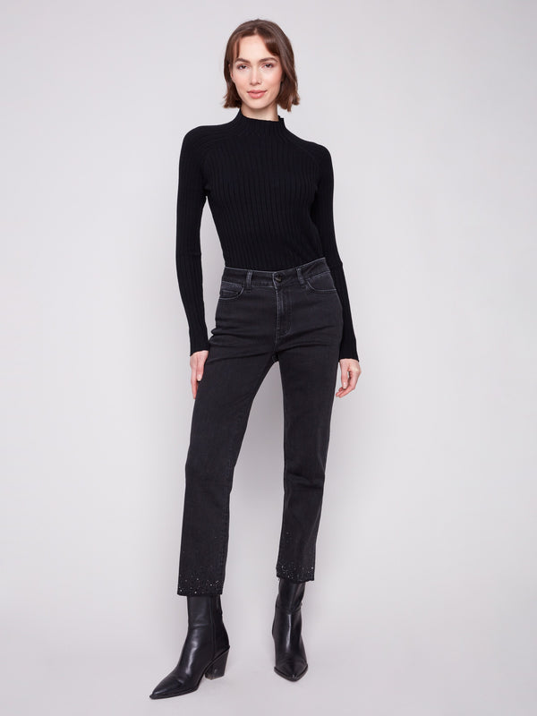 Black straight-leg jeans in a long length, featuring stretch denim for comfort by Charlie B.