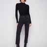 Black straight-leg jeans in a long length, featuring stretch denim for comfort by Charlie B.