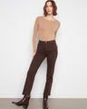Brown pants with a straight leg design and a hidden elastic waistband for comfort. Crafted from stretch twill by Charlie B.