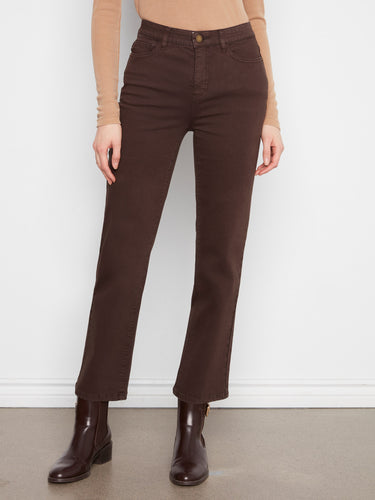 These brown pants feature a zip fly and button closure, offering a classic look with modern functionality by Charlie B.