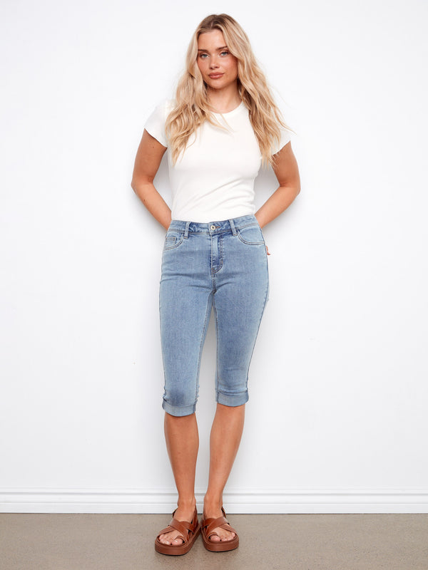 Enjoy the perfect blend of style and comfort in these slim-fit capri denim pants by Charlie B.