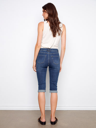 Light blue capri-length pedal pushers in stretch denim, offering comfort and style by Charlie B.