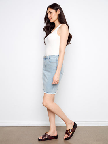 Featuring stretch denim, this light blue skirt offers comfort and style in one versatile piece. Created by Charlie B.