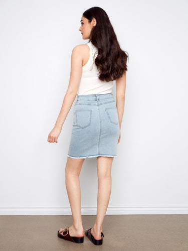 A classic light blue denim skirt with five pockets, perfect for everyday wear and functionality. Made by Charlie B.