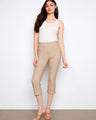 Beige capri pants with a slim leg design, featuring a stylish cuffed hem. Crafted for comfort and elegance by Charlie B.