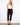 Black capri pants with a slim leg, designed in a pull-on style for ease and comfort by Charlie B.