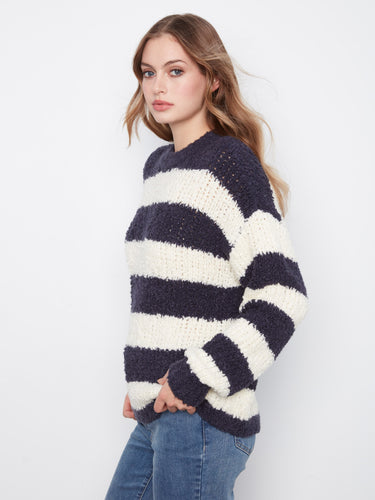 Relaxed fit ensures comfort and ease in this stylish striped sweater, perfect for any casual occasion. By Charlie B.