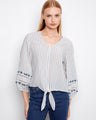 Striped blouse with intricate embroidery detail at the sleeves, crafted from 100% cotton by Charlie B.