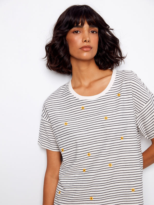 Relaxed fit striped tee adorned with subtle floral embroidery details by Charlie B.