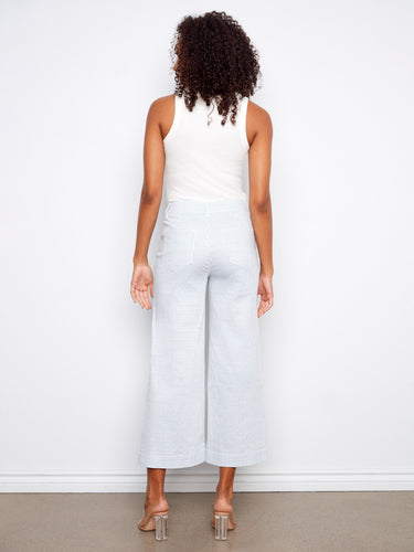 Regular rise striped pants with an elegant flare fit and practical front patch pockets by Charlie B.