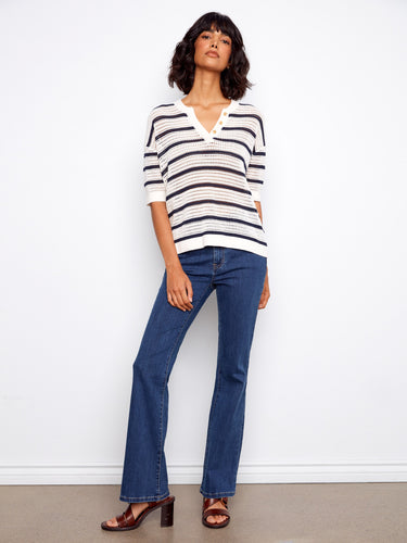 Elegant fishnet crochet design enhances the striped pattern of this comfortable top by Charlie B.