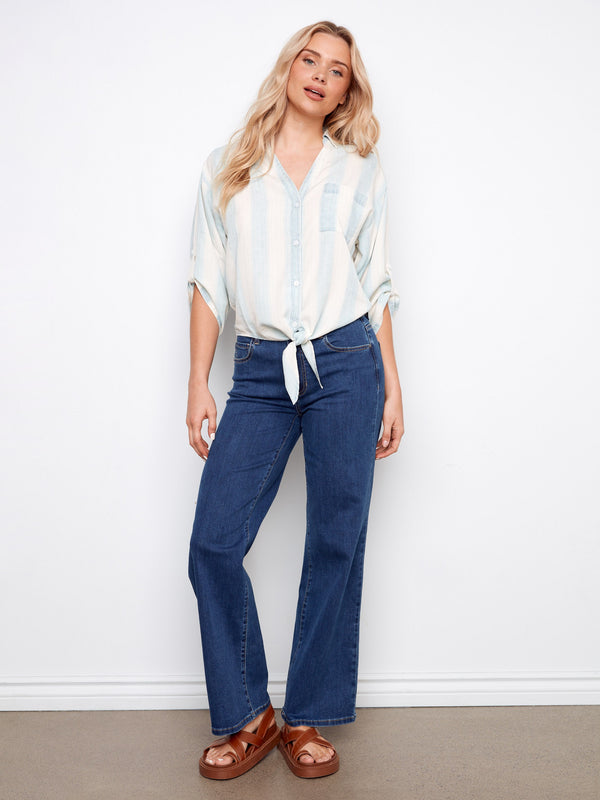 Featuring 3/4 roll-up sleeves, this shirt combines comfort and versatility for any occasion. Crafted by Charlie B.