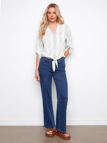 Experience the perfect blend of style and functionality with this button-down shirt, complete with chest pockets and rolled sleeves. By Charlie B.