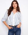 Blue and white striped shirt featuring a classic shirt collar, perfect for versatile styling by Charlie B.
