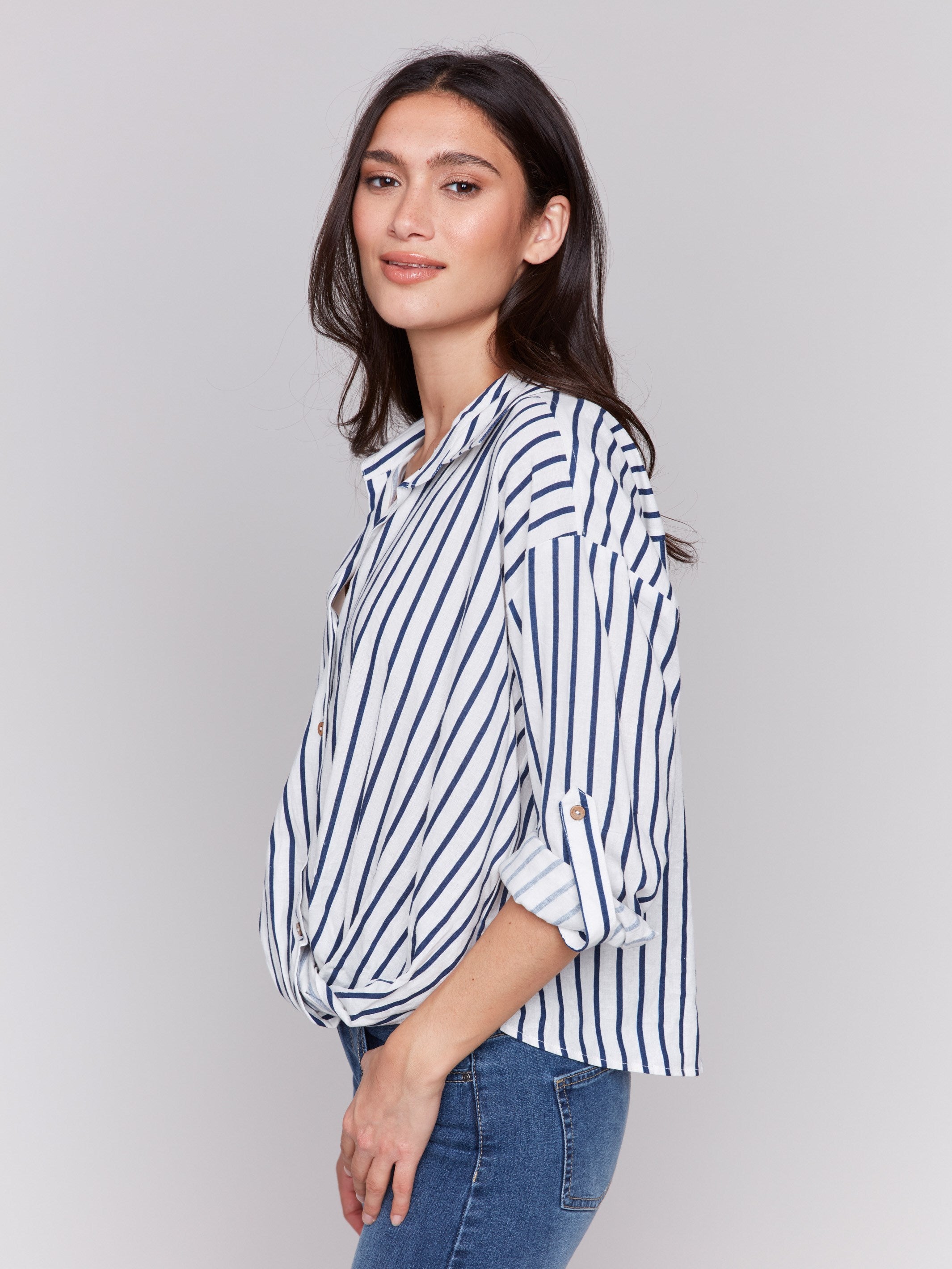 3/4 sleeve shirt featuring a front twist detail by Charlie B.