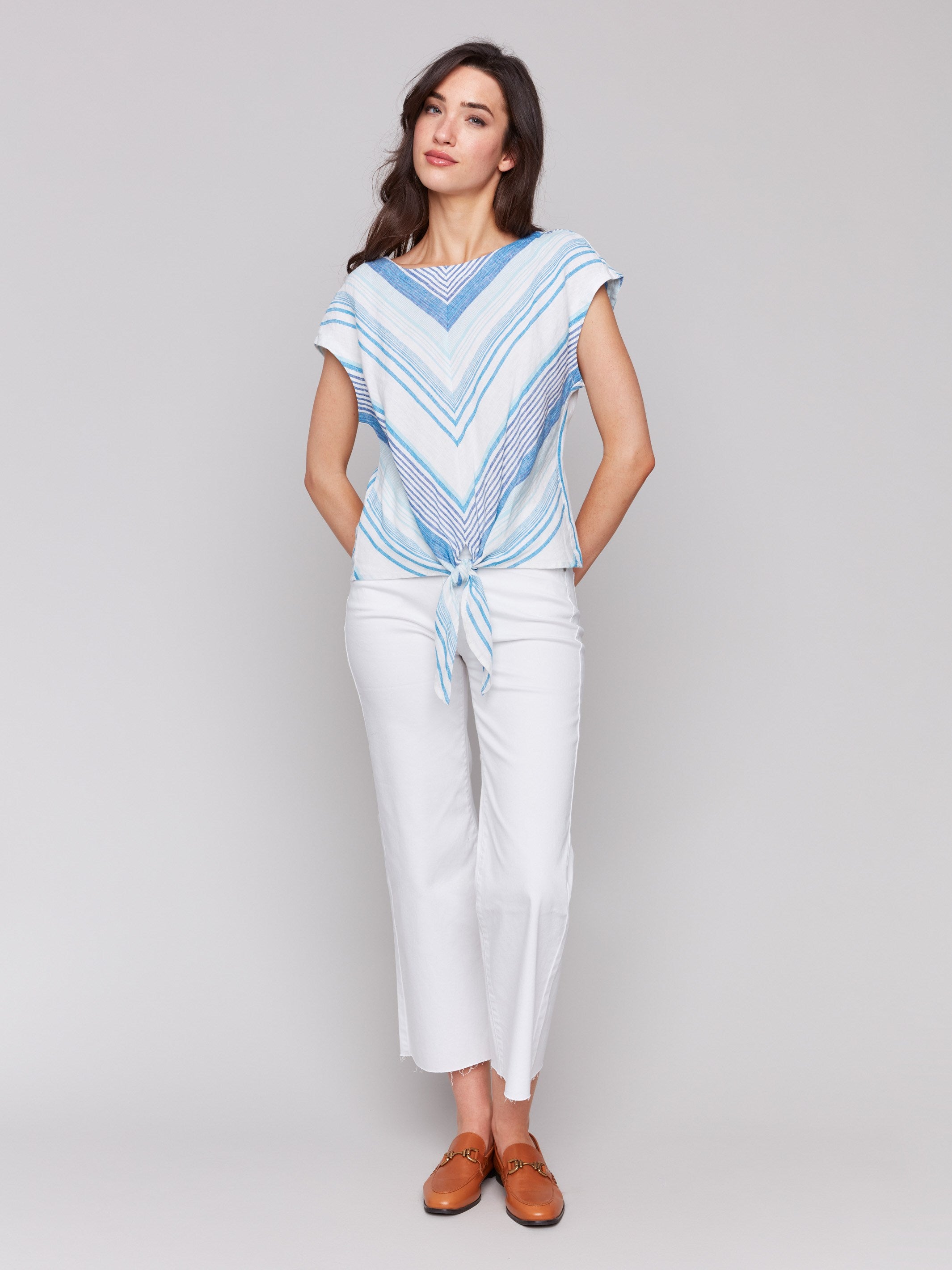 Stylish cap sleeves on a coastal-inspired blouse by Charlie B.