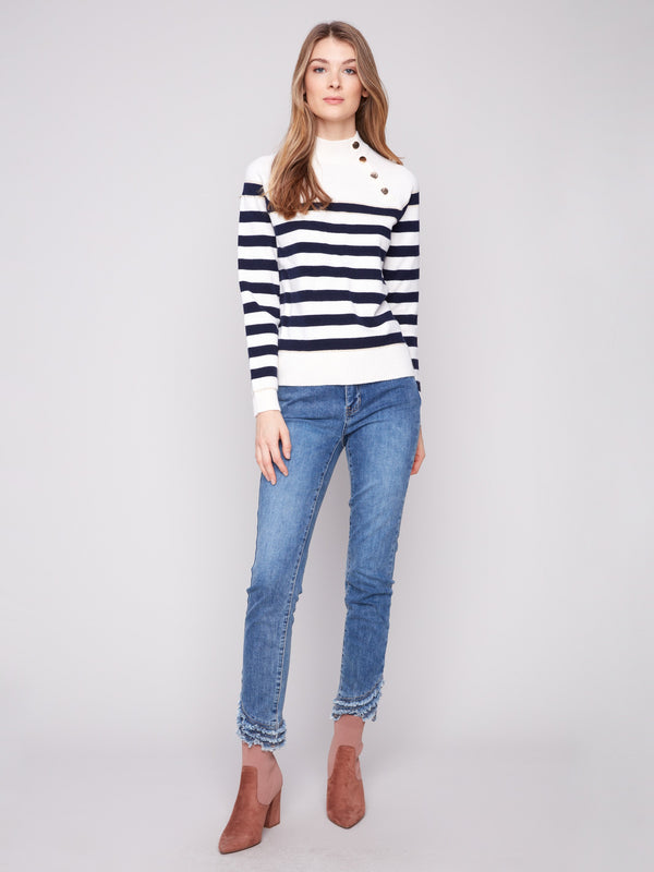 Elegant raglan sleeves enhance the comfort and fit of this chic striped sweater by Charlie B.