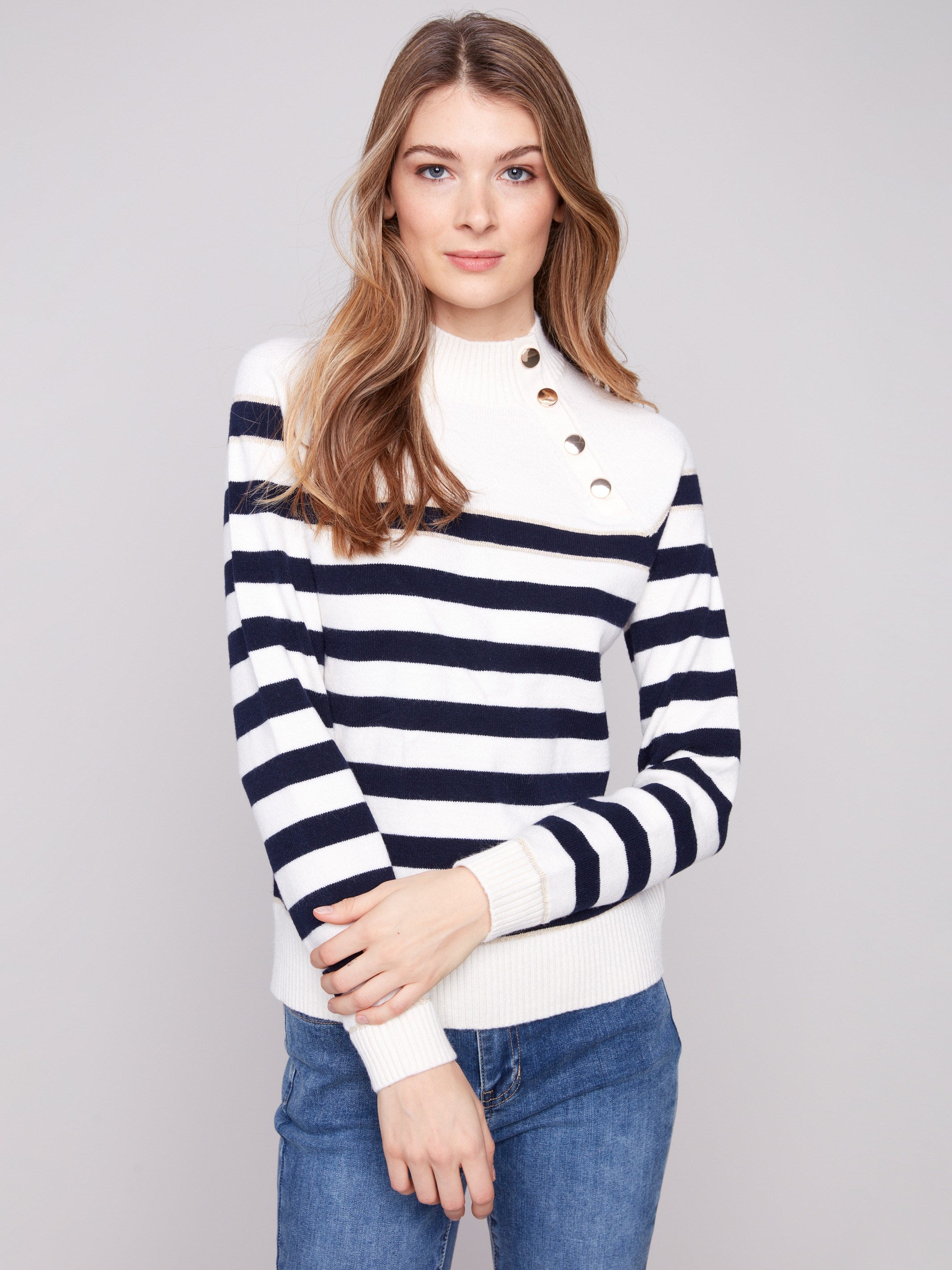 This sweater's button details at the neck add a unique touch to its timeless design by Charlie B.