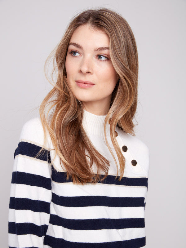 Subtle gold detail on this striped sweater adds an element of sophistication and style by Charlie B.