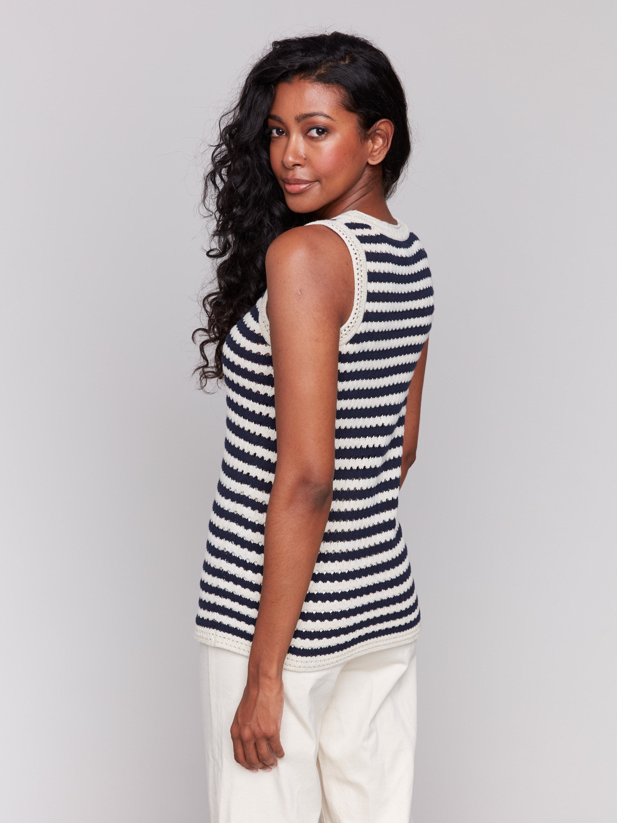 Cotton sleeveless sweater with a unique stitching pattern by Charlie B.