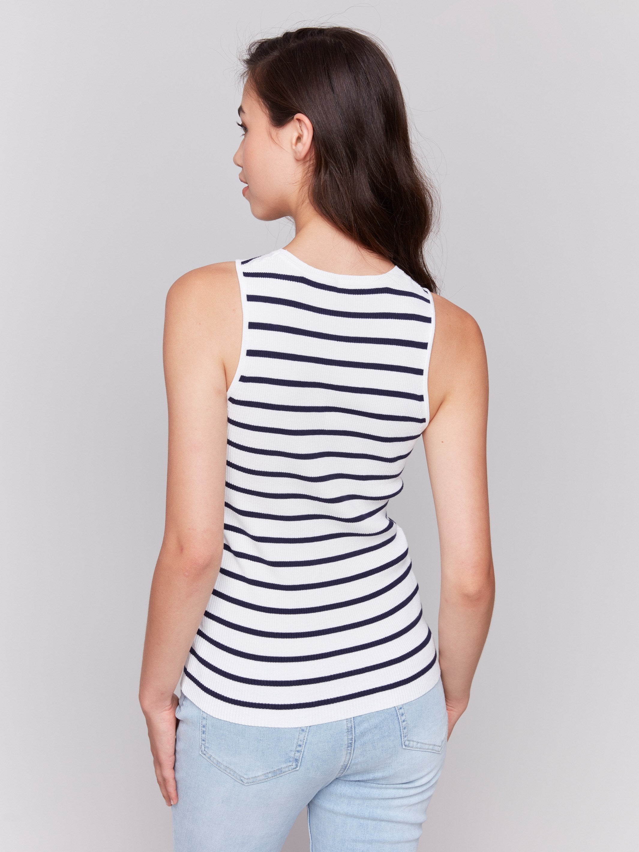 White sleeveless top with a stylish striped pattern by Charlie B.