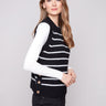 Black sweater vest featuring a crew neck and white stripes, ideal for layering with your favorite outfits by Charlie B.