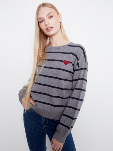 Fashionable striped top with ribbed cuffs and hem for added comfort by Charlie B.