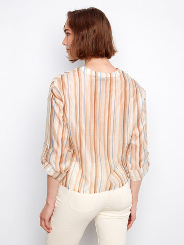 Casual yet stylish top with roll-up sleeves, offering both comfort and fashion-forward design in one piece. By Charlie B.