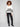 Stylish ecru V-neck sweater with distinct wide cuffs and elegant button accents for a modern look by Charlie B.