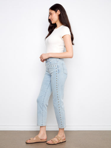 The stud details on these jeans add a touch of edgy sophistication to any outfit. Make a statement effortlessly by Charlie B.