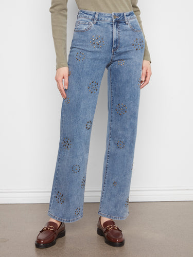 These jeans boast unique front stud detailing, offering a chic and modern flair to any outfit by Charlie B.