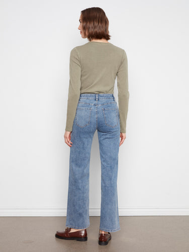 Experience comfort in stretch denim material, ensuring ease of movement while maintaining fashionable appeal by Charlie B.