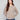 Heather taupe sweater featuring dolman sleeves and ribbed cuffs, perfect for a cozy look by Charlie B.
