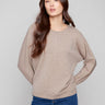 Heather taupe sweater featuring dolman sleeves and ribbed cuffs, perfect for a cozy look by Charlie B.