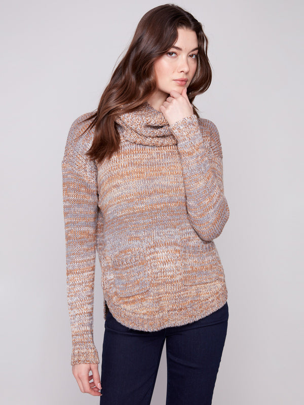 Sweater in fog color, showcasing its removable scarf for versatile styling options by Charlie B.