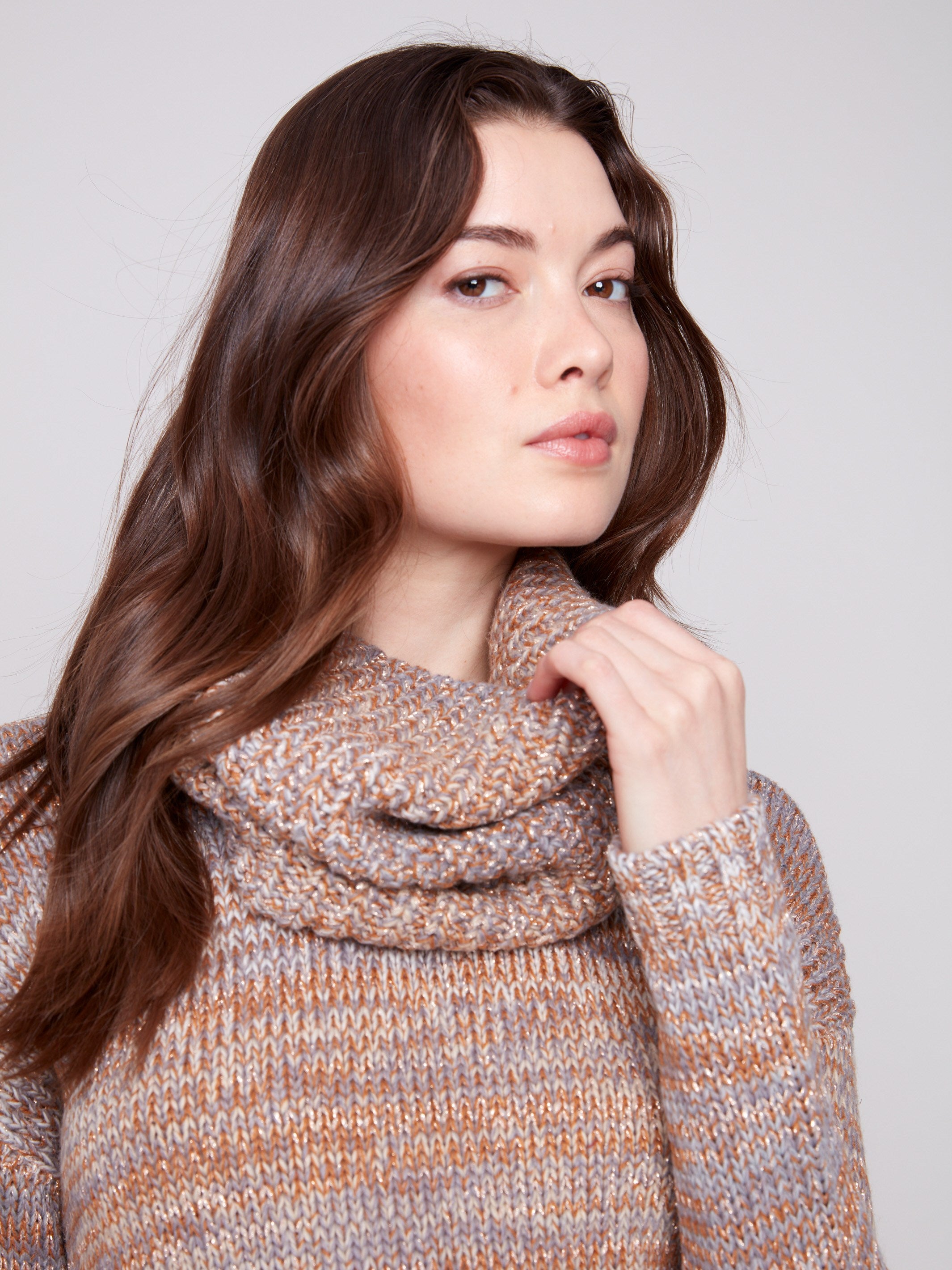 Fog-colored sweater featuring subtle metallic detail, perfect for adding sparkle to any look by Charlie B.